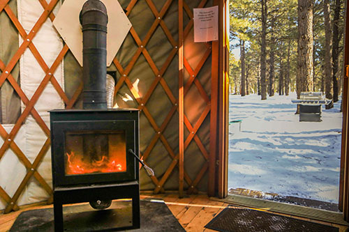 Woodstove in a yurt at Arizona Nordic Village